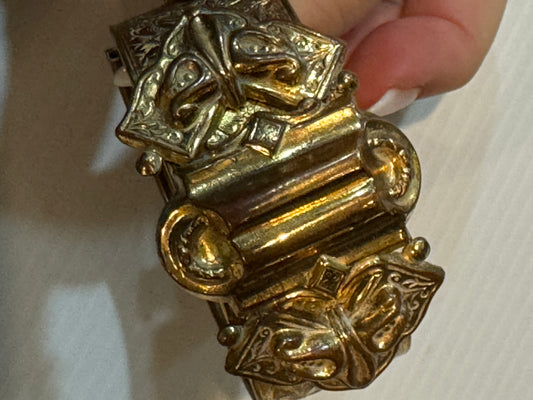Gold tone vintage 1960s cuff bracelet with flower etching