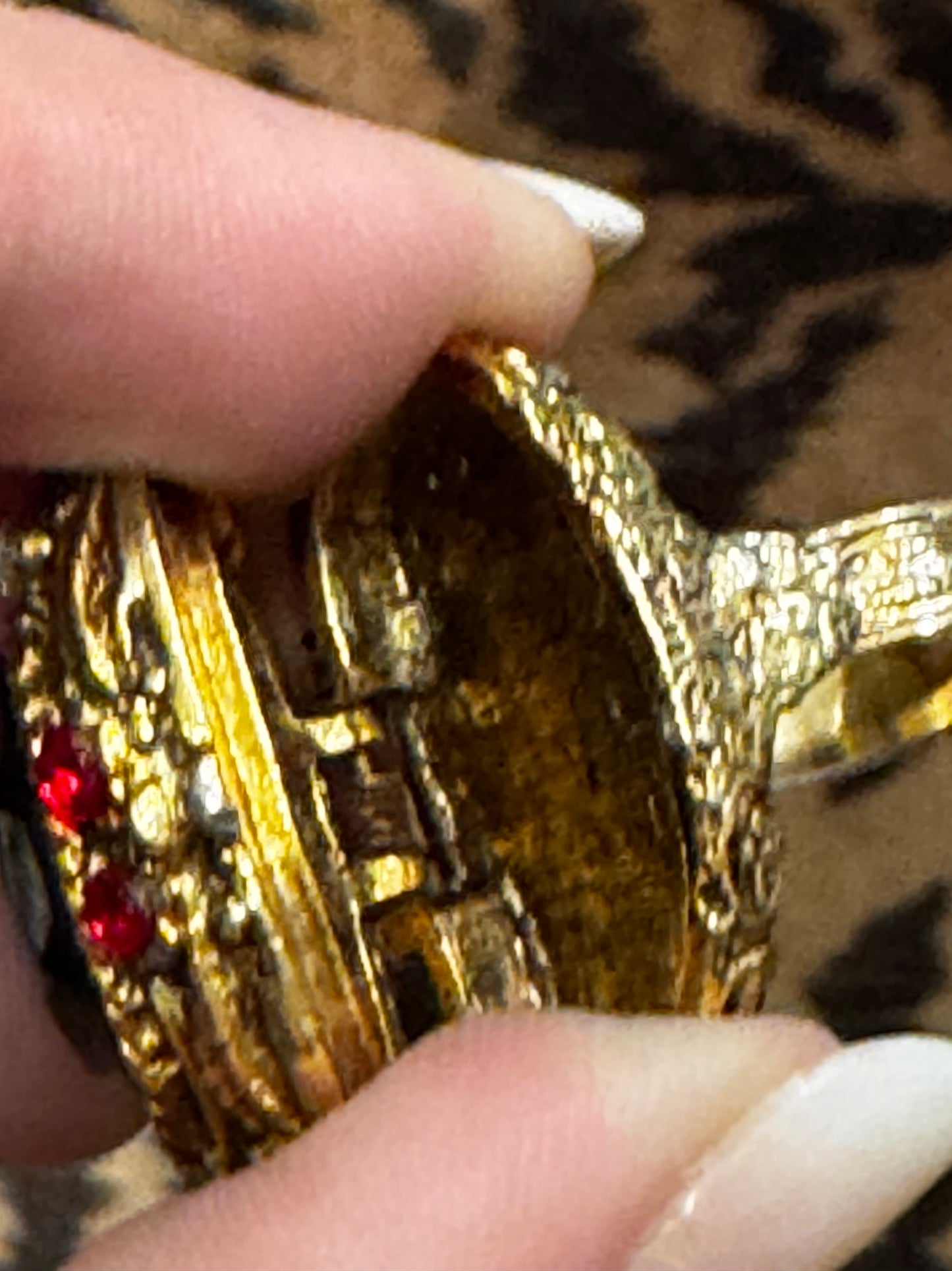 Gorgeous 1960s "poison" gold tone with black cabochon and red rhinestone ring