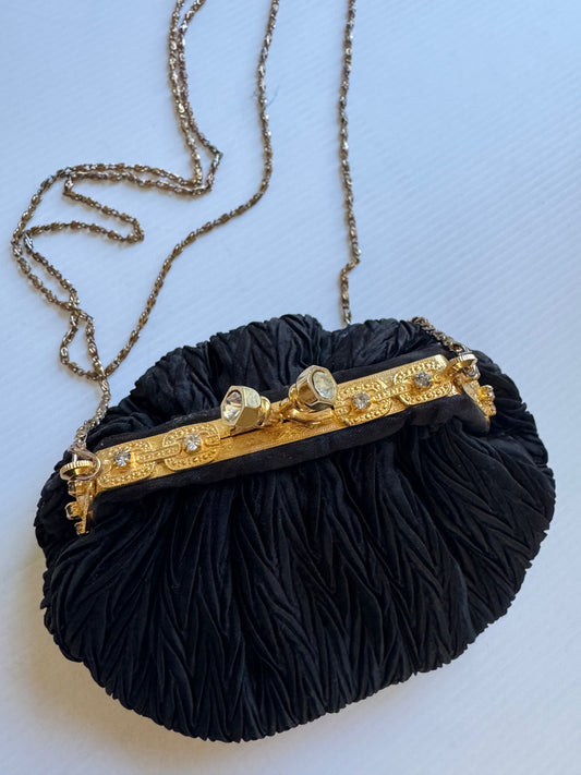Elegant 1960s plisse black silk minaudiere evening bag with beautiful gold hardware and strap long enough for Crossbody