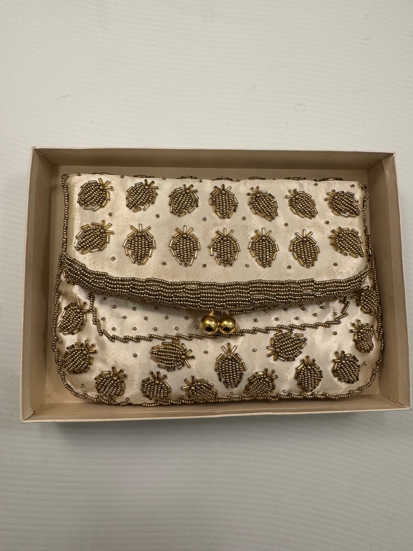 Stunning vintage silk clutch with gold beads in original box with original note