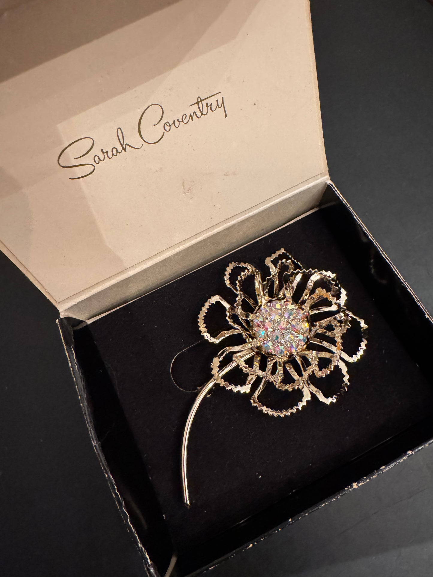 Vintage Sarah Coventry filagree flower brooch with watermelon stonein original box