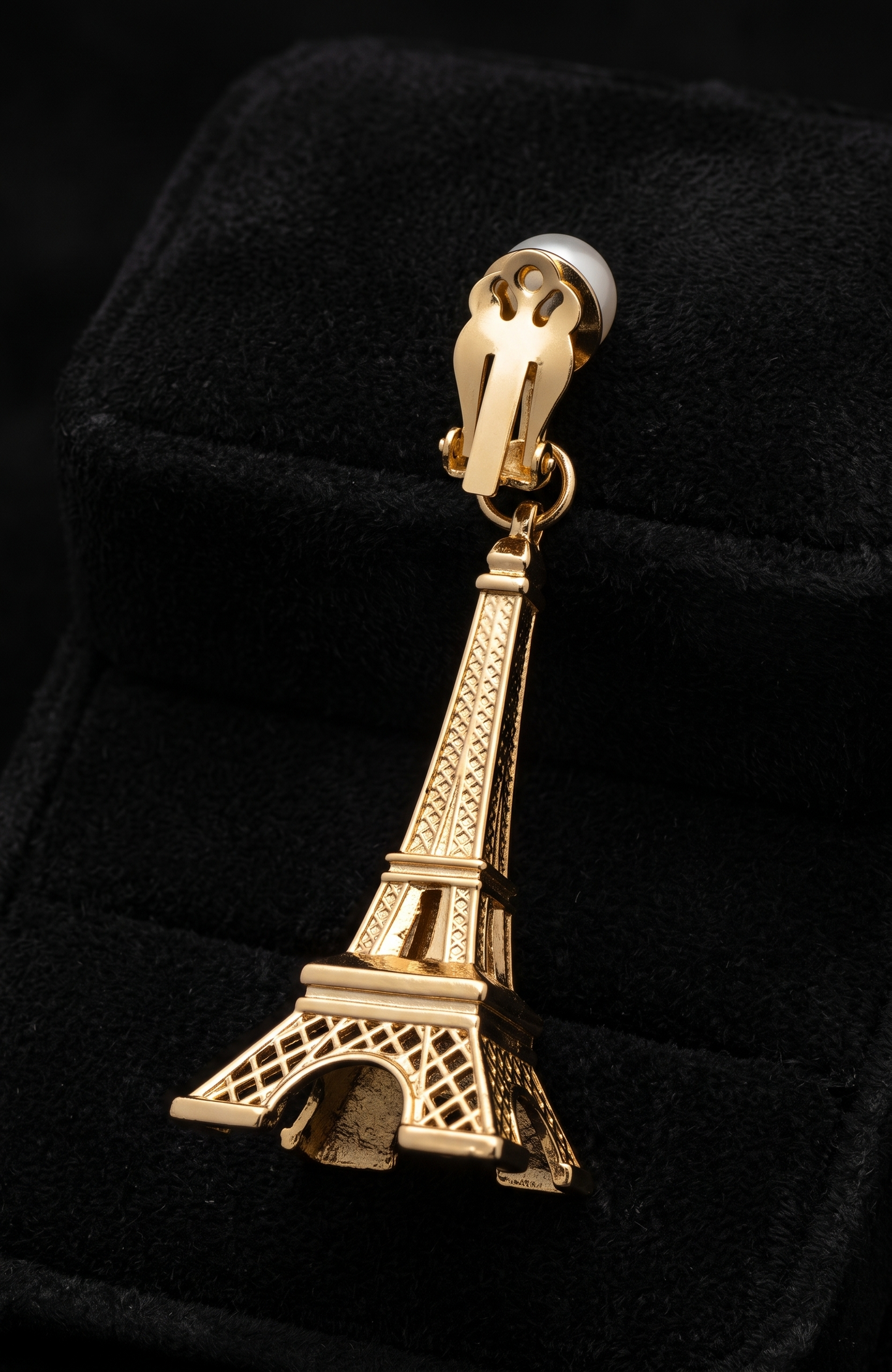 Vintage clip on Eiffel Tower with pearl earrings. From the collection of Linda Fargo