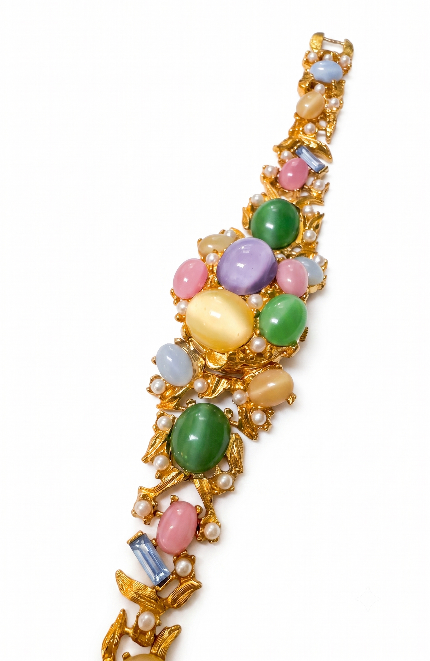 Vintage 1970s pastel cabachon bracelet. But guess what there's a secret watch. Does it work? That is the question ❤️