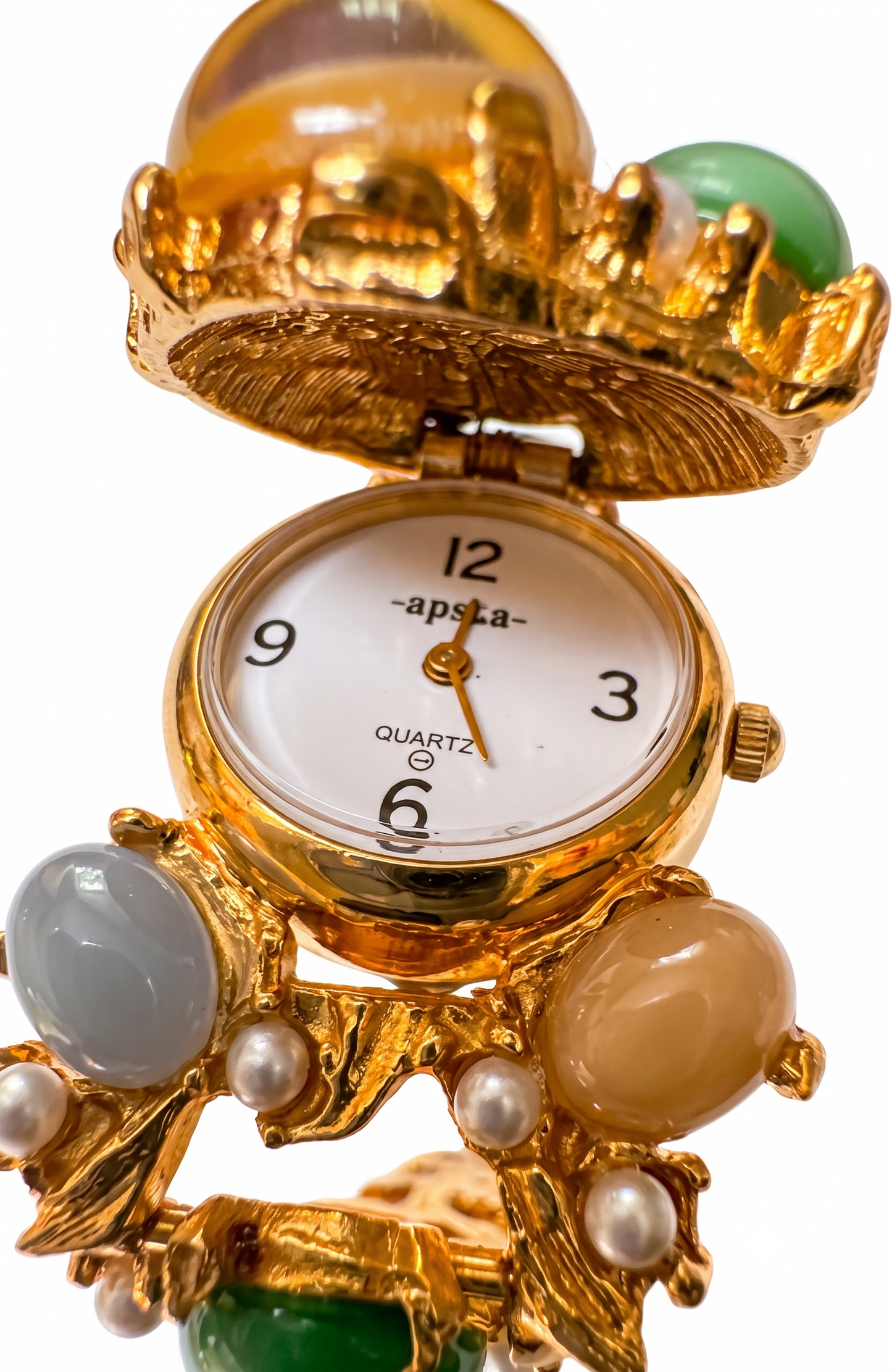 Vintage 1970s pastel cabachon bracelet. But guess what there's a secret watch. Does it work? That is the question ❤️