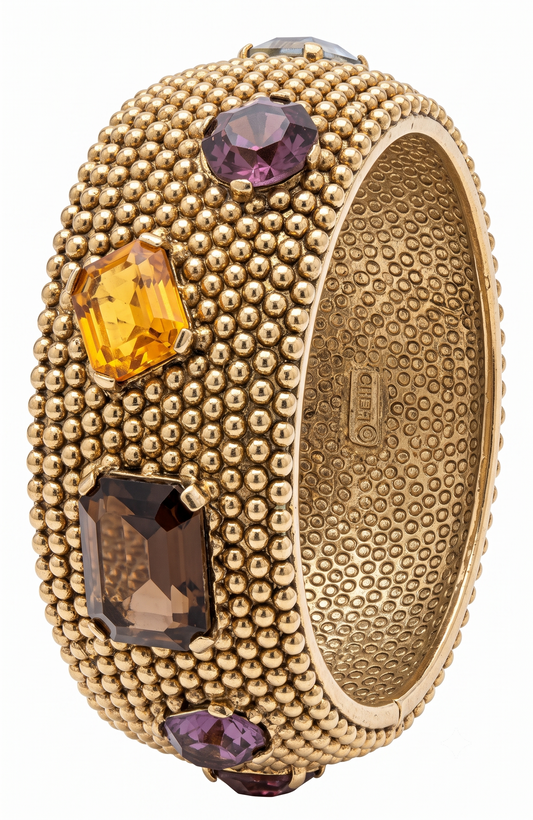 Vintage 1960s CINER clamper/ cuff bracelet with amber and topaz colored rhinestones