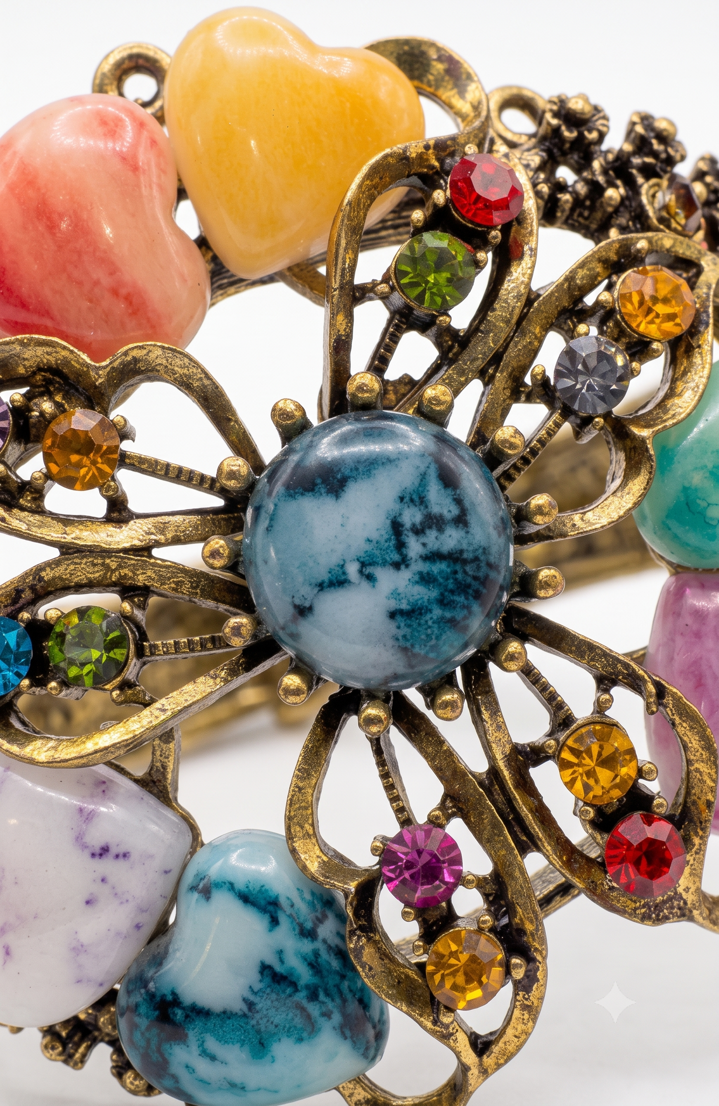 Beautiful 1980s clamper/cuff bracelet with colored rhinestones and heart shaped stones