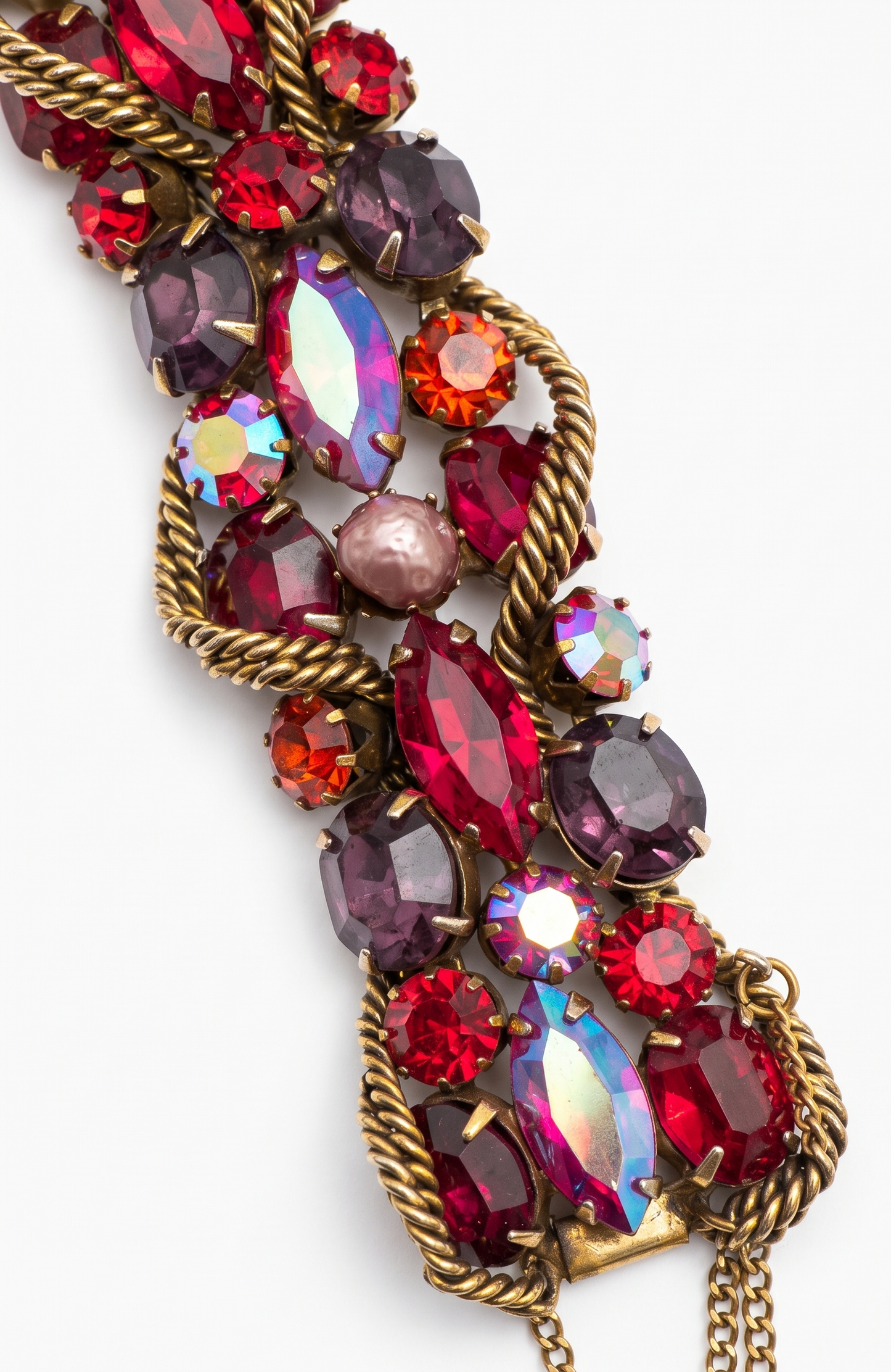 1950s signed KRAMER of NY rhinestone bracelet featuring red crystals and aurora borealis with a gold link chain throughout ￼