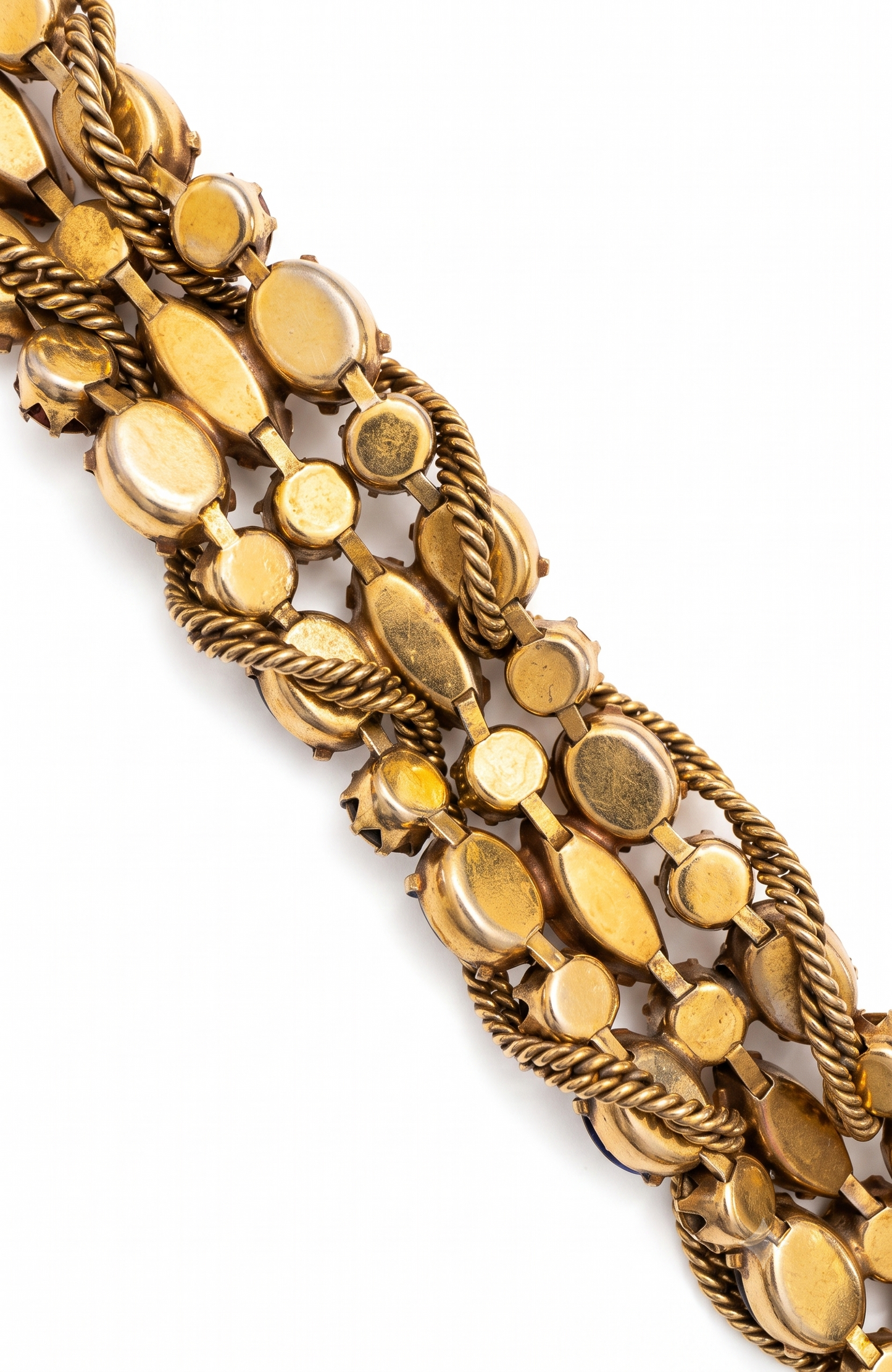1950s signed KRAMER of NY rhinestone bracelet featuring red crystals and aurora borealis with a gold link chain throughout ￼