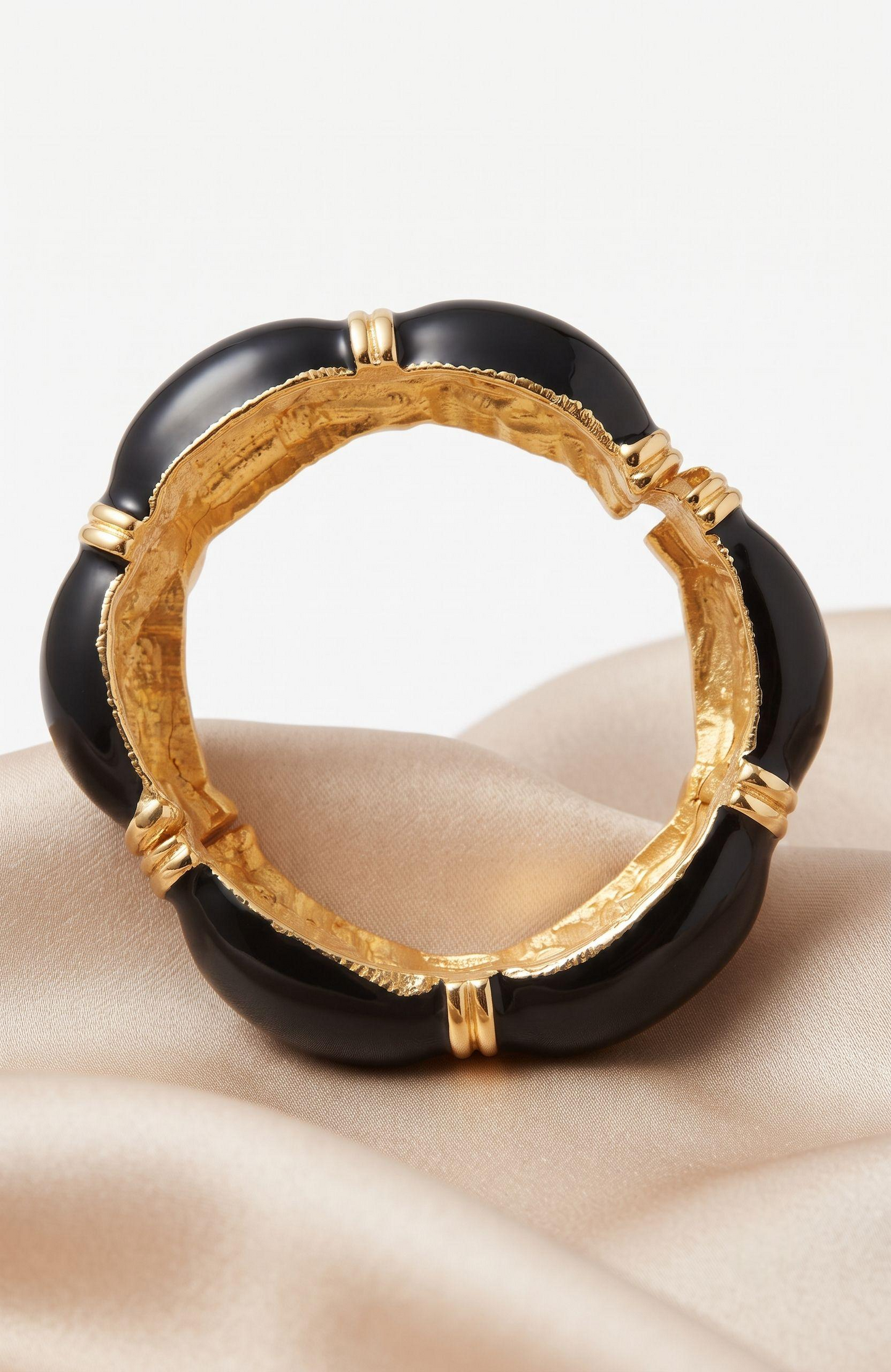 Beautiful 1970s gold tone and black enamel clamper bracelet