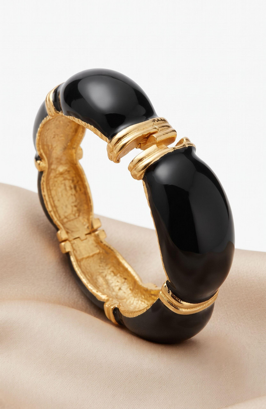 Beautiful 1970s gold tone and black enamel clamper bracelet