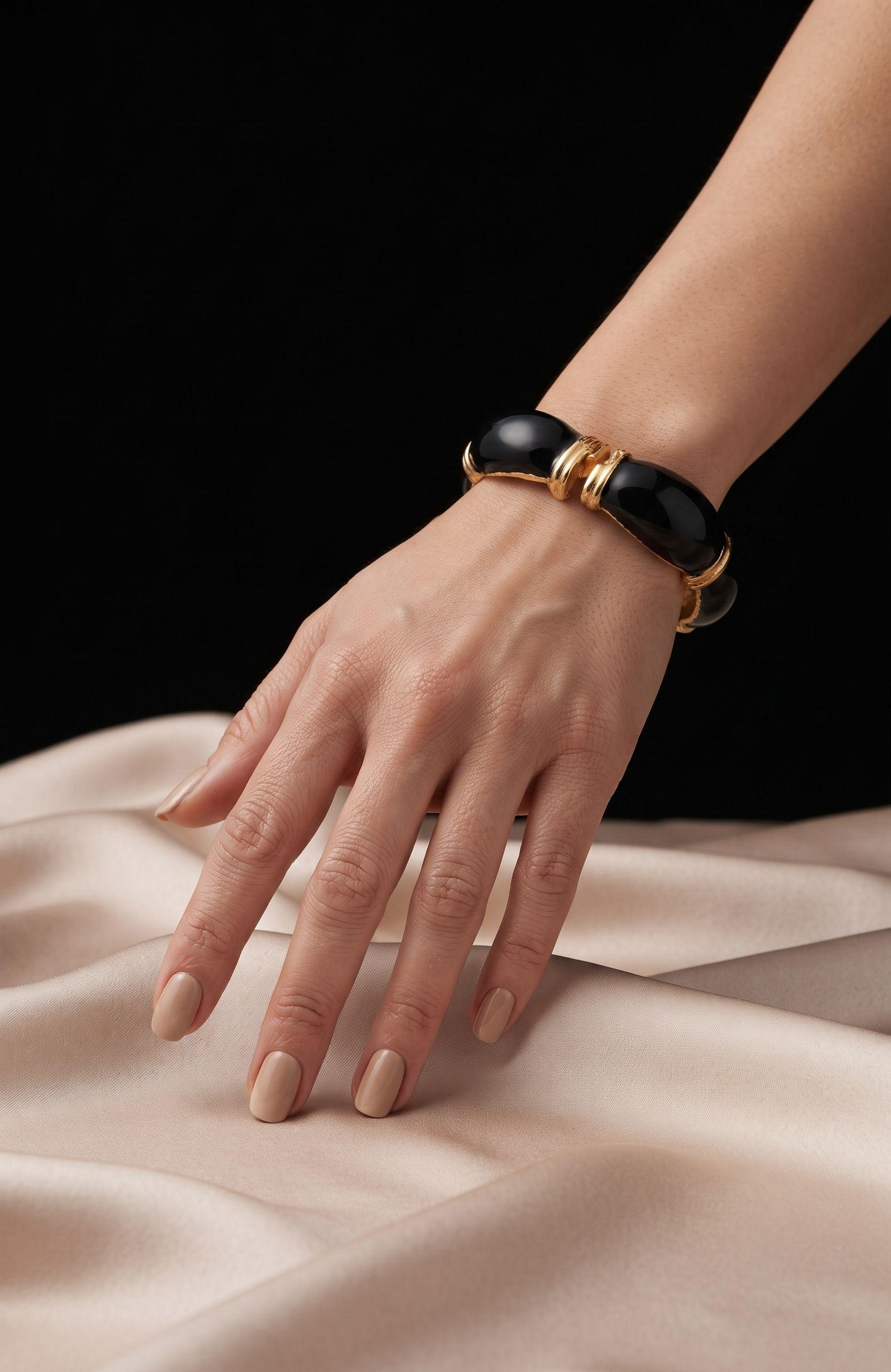 Beautiful 1970s gold tone and black enamel clamper bracelet