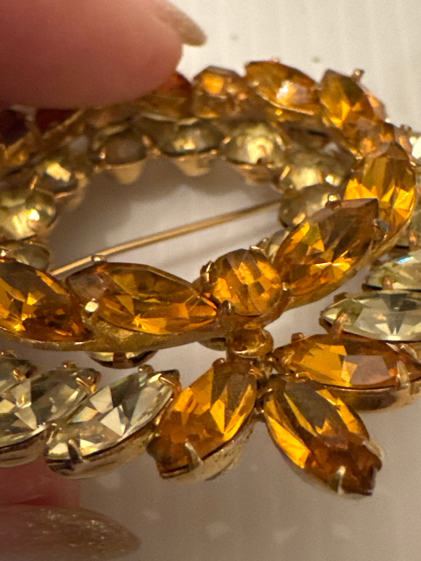Signed KRAMER of New York 1950s dimensional wreath bow with amber colored and light champagne colored glass stones