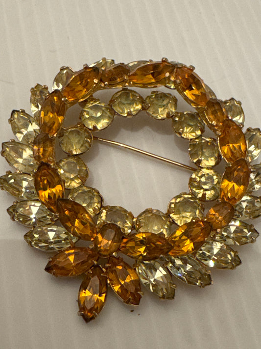 Signed KRAMER of New York 1950s dimensional wreath bow with amber colored and light champagne colored glass stones