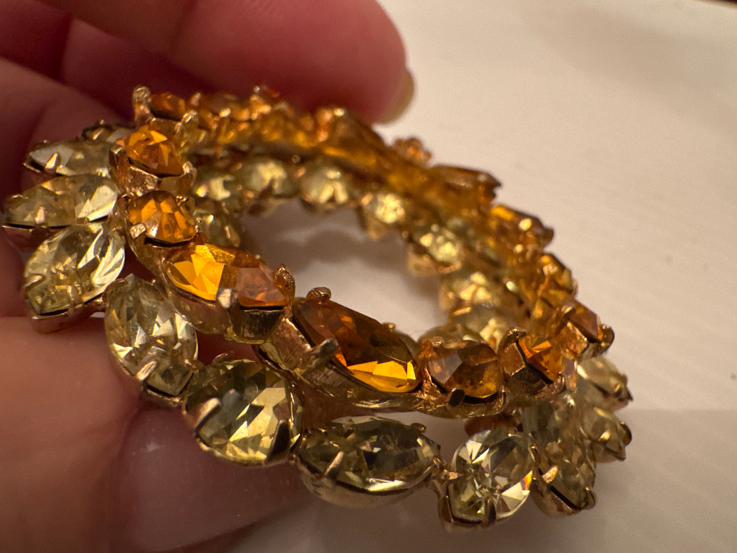 Signed KRAMER of New York 1950s dimensional wreath bow with amber colored and light champagne colored glass stones